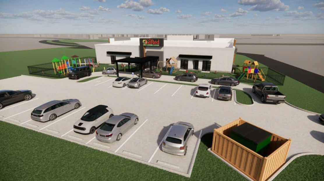 Architectural rendering of the proposed Gifted Early Learning Academy Scott campus from above, showing the building entrance canopy, two fenced playgrounds, and parking lot.